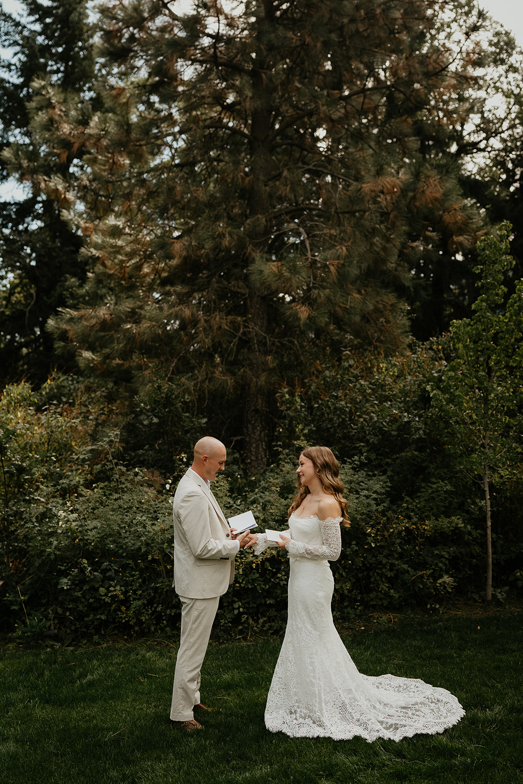 newlywed sharing private vows during their Rocky Hill Oregon wedding.