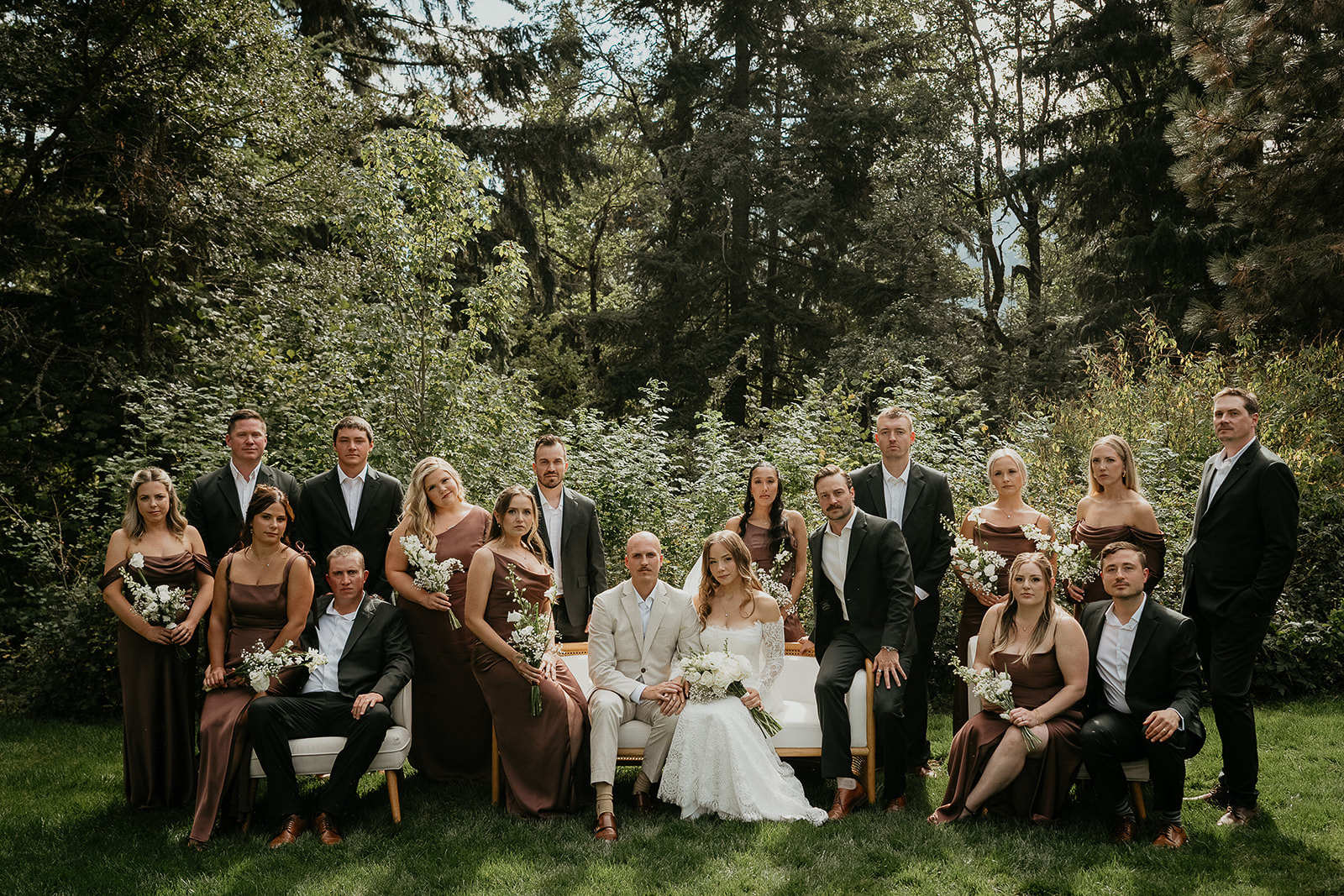 newlyweds and their wedding party posing for an editorial style photo during a Rocky Hill Oregon wedding.