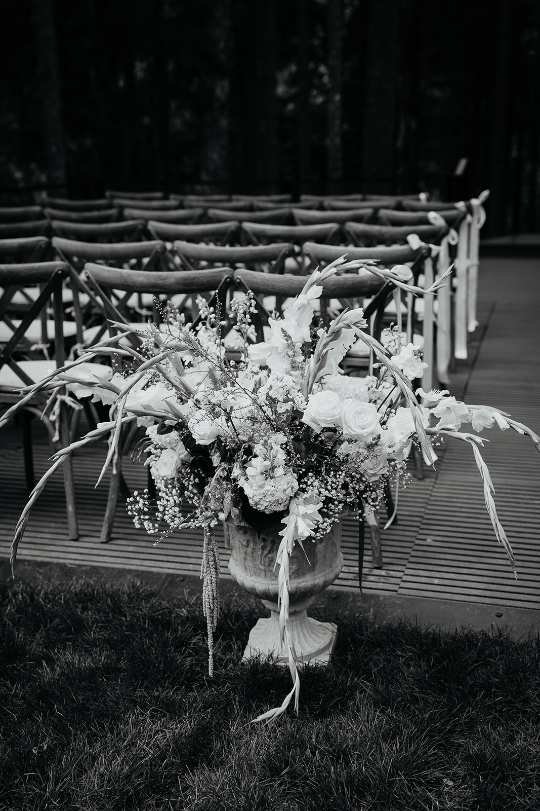 flowers and chairs set up on the during their Rocky Hill Oregon wedding deck.
