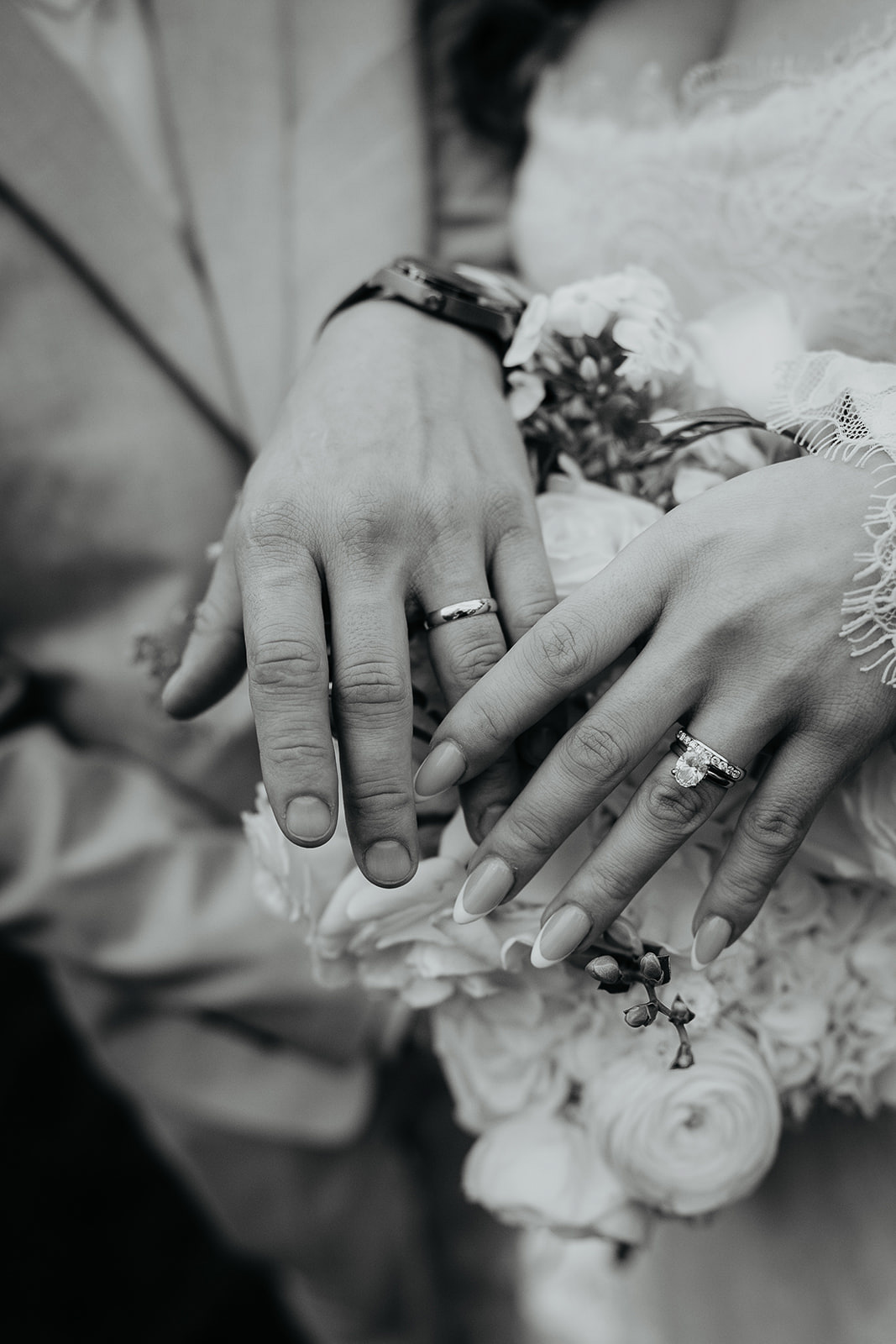 the newlyweds showing their rings.