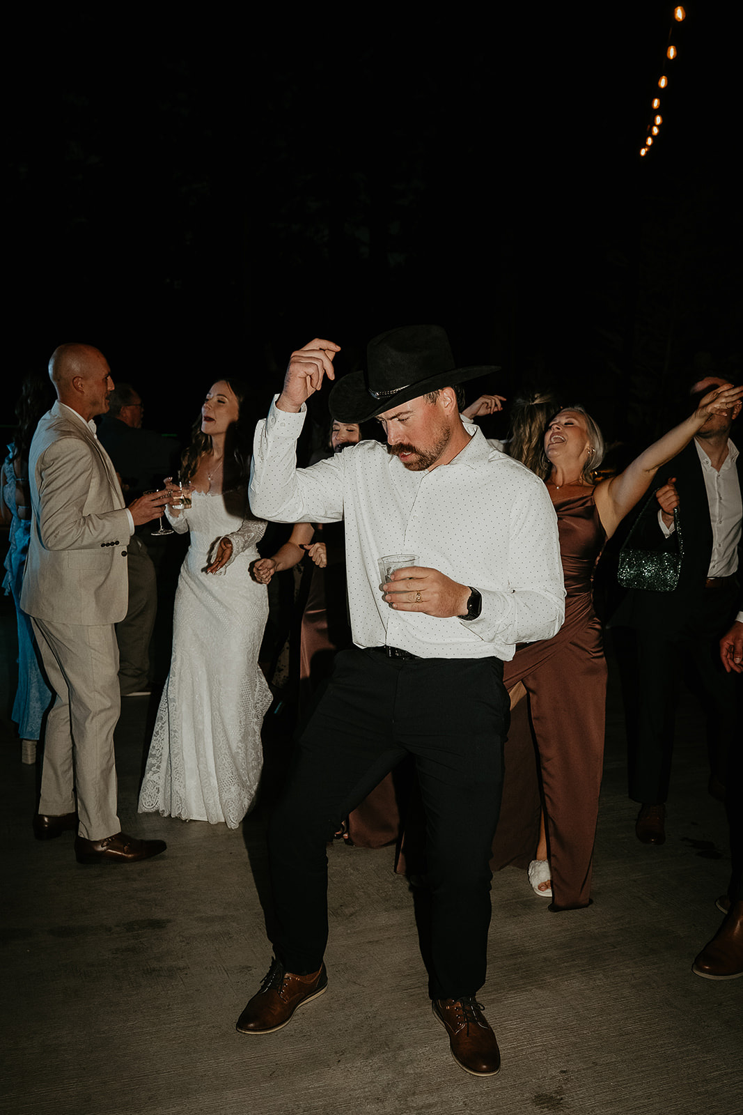 a wedding guest dancing during during a Rocky Hill Oregon wedding.