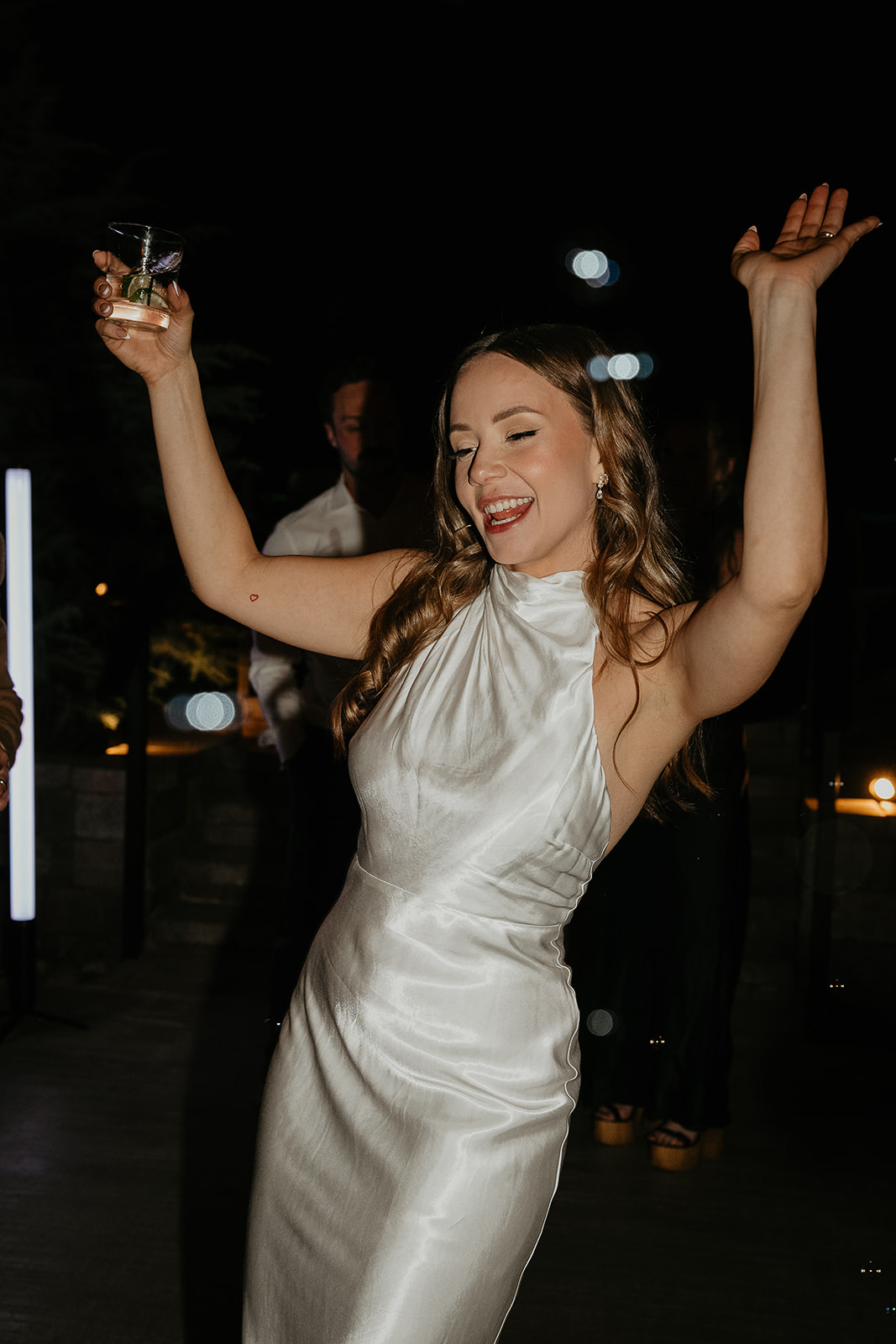 the bride dancing during her wedding.