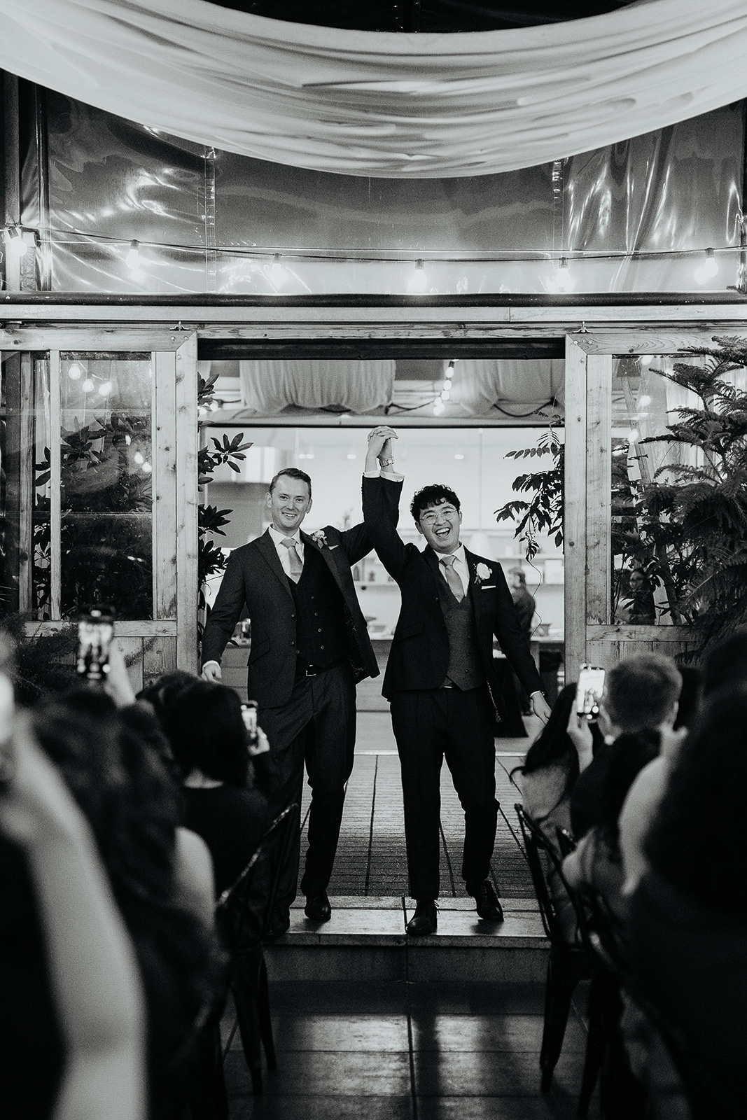 the newlyweds walking into their reception during their forest elopement in Oregon.