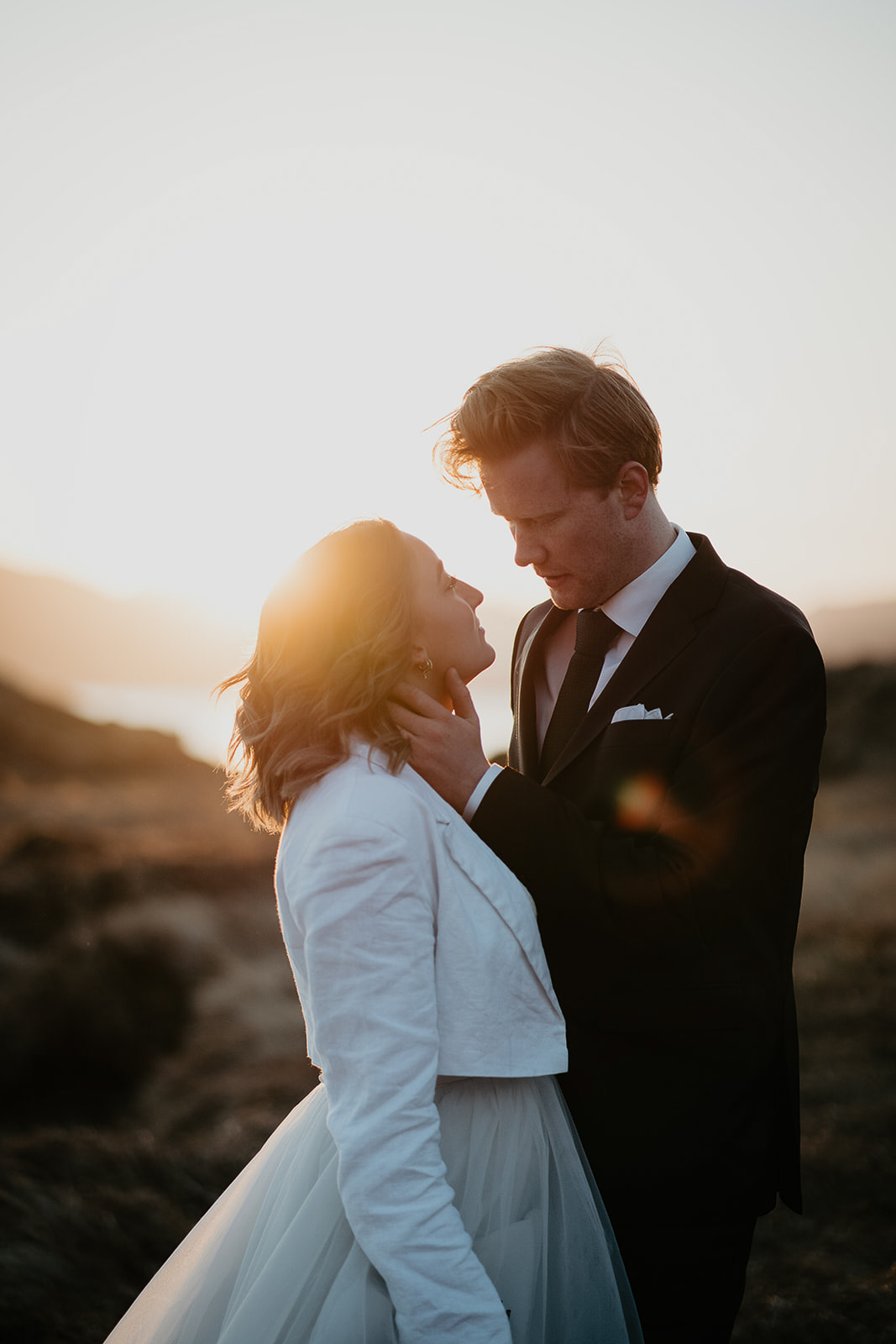 newlyweds about to kiss during the elopement in Iceland.