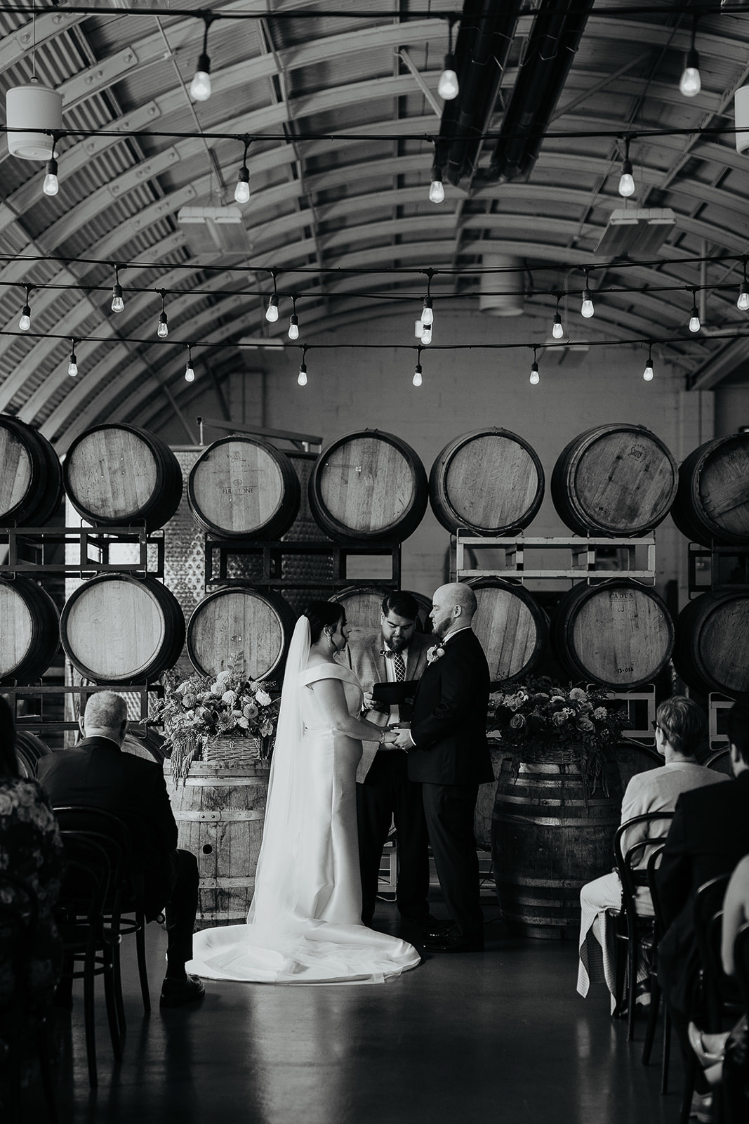 newlyweds holding hands during their Coopers Hall wedding.