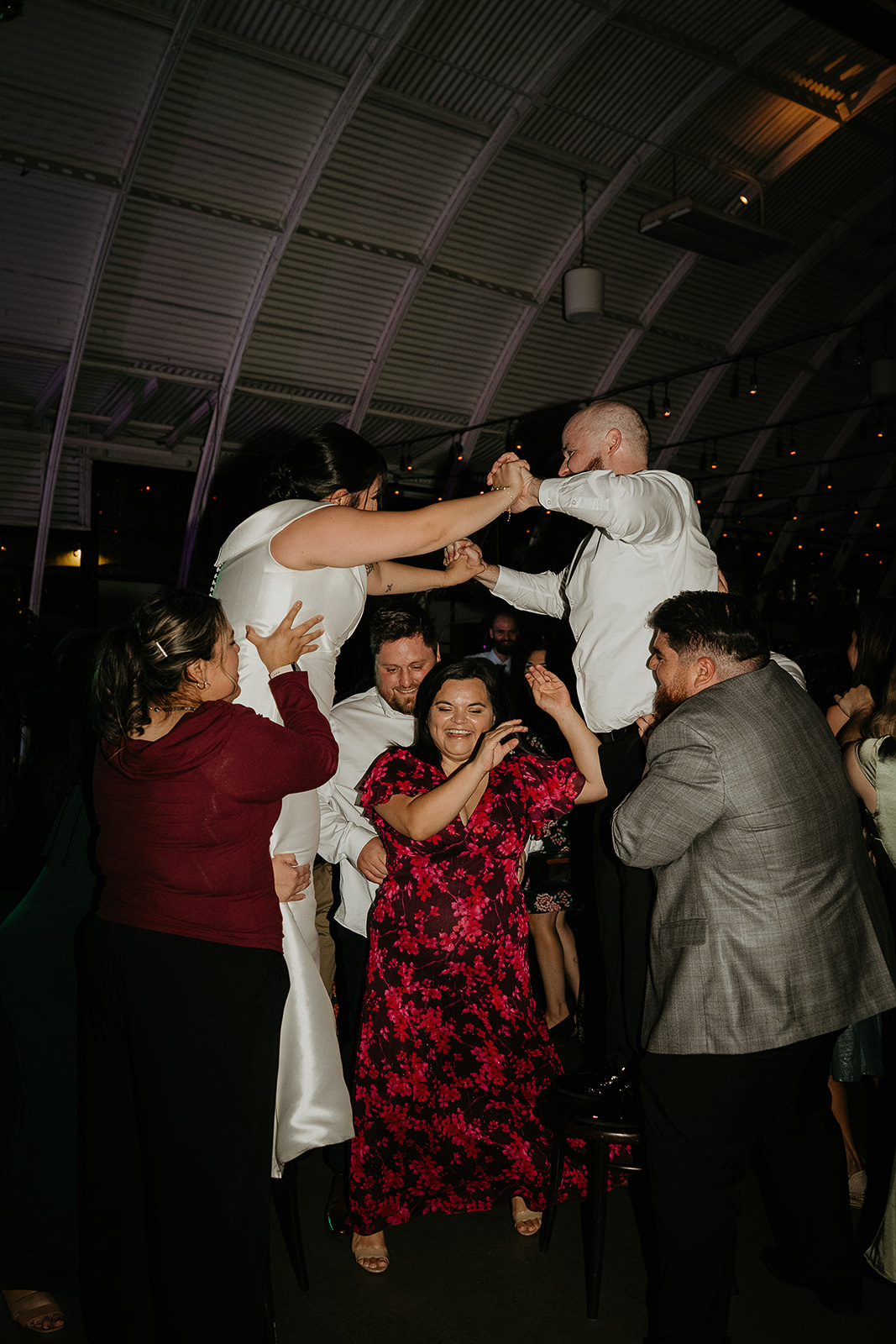 newlyweds dancing at the end of their during their Coopers Hall wedding.