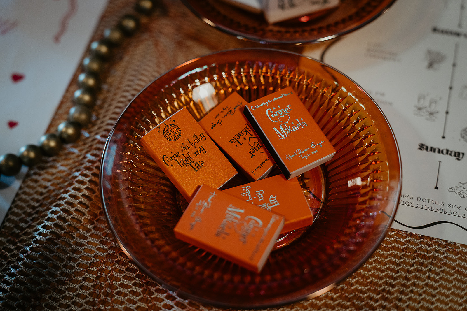 a bowl full of custom matches for a vintage inspired wedding.