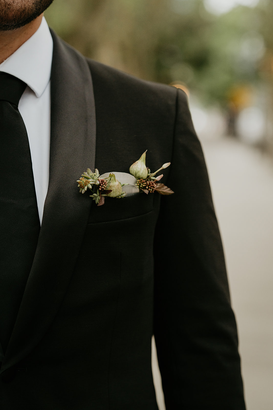 flowers in a suit's pocket square.