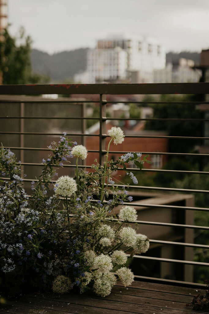 Flowers and the Portland skyline in the background.