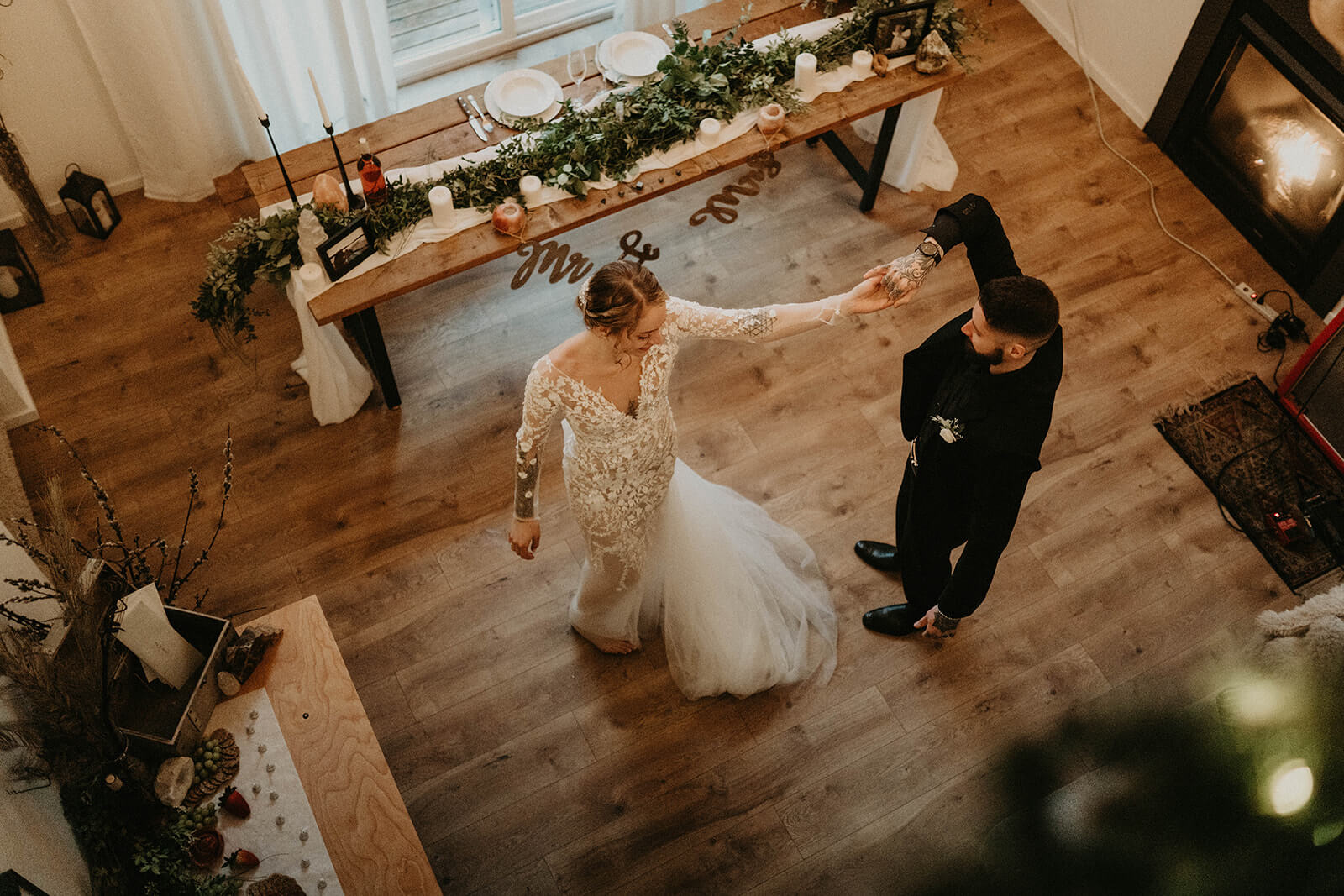 Bride and groom first dance at cozy cabin in Mount Rainier
