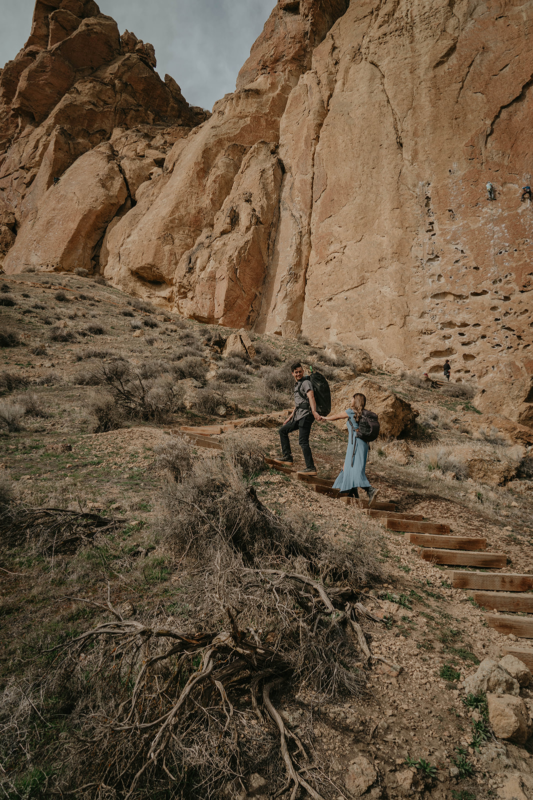 Couple walking up the stairs at Smith Rock State Park
