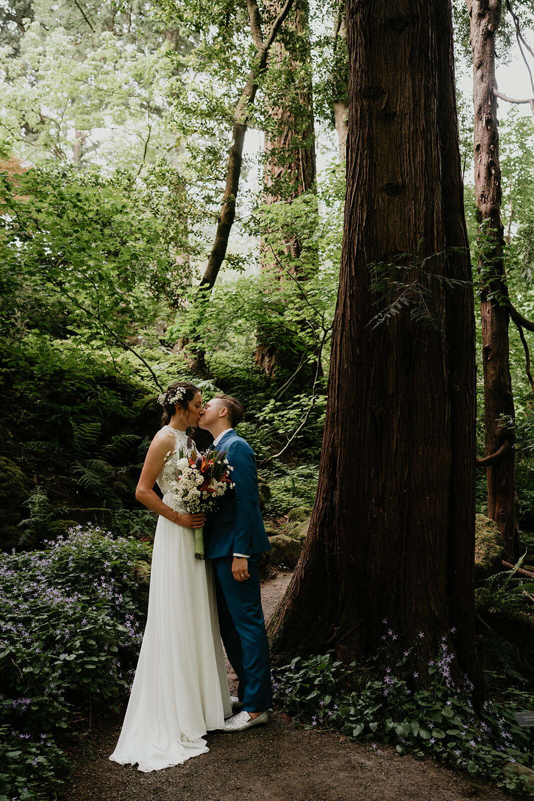 Wedding portraits in the forest with two brides
