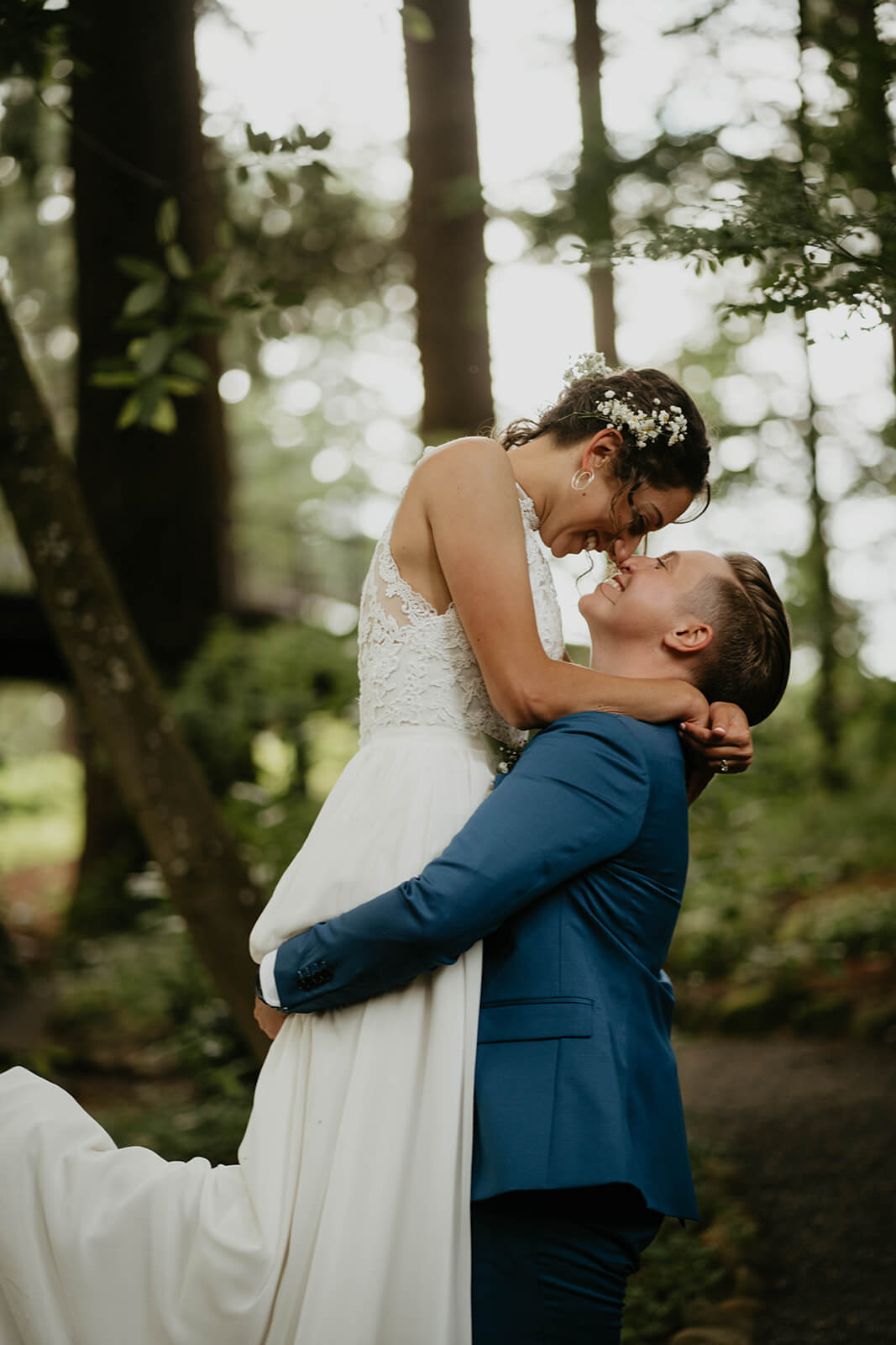 Wedding portraits in the forest with two brides