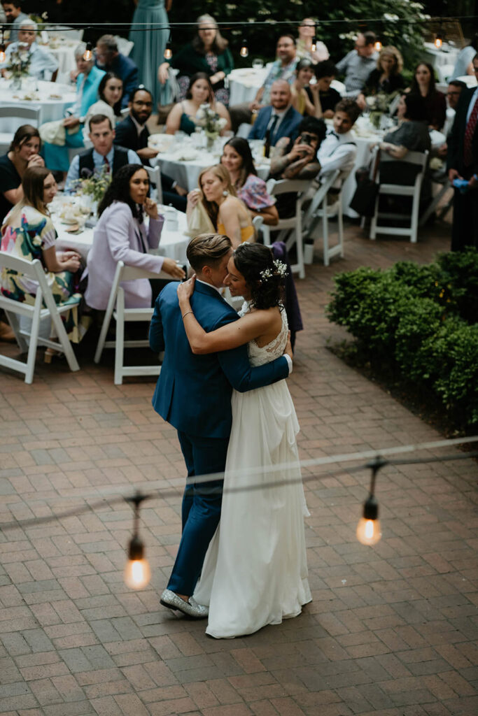 Two brides dancing at Leach Botanical Garden wedding reception