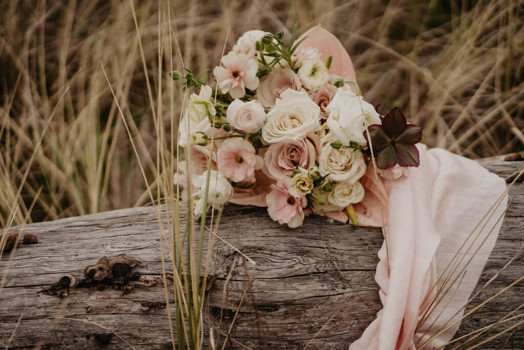 Pastel pink and white wedding floral arrangement