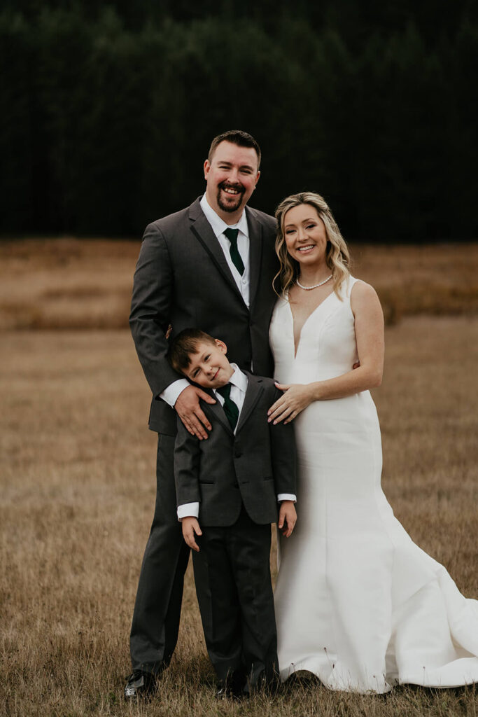 Bride and groom portraits with their son
