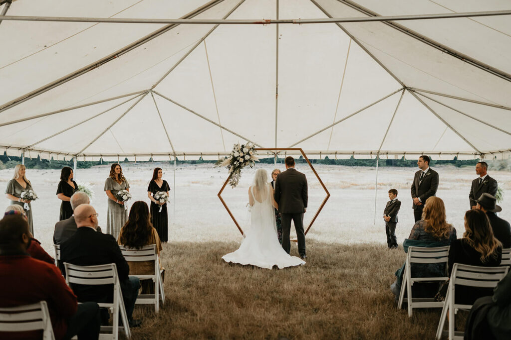 Oregon wedding ceremony under a tent
