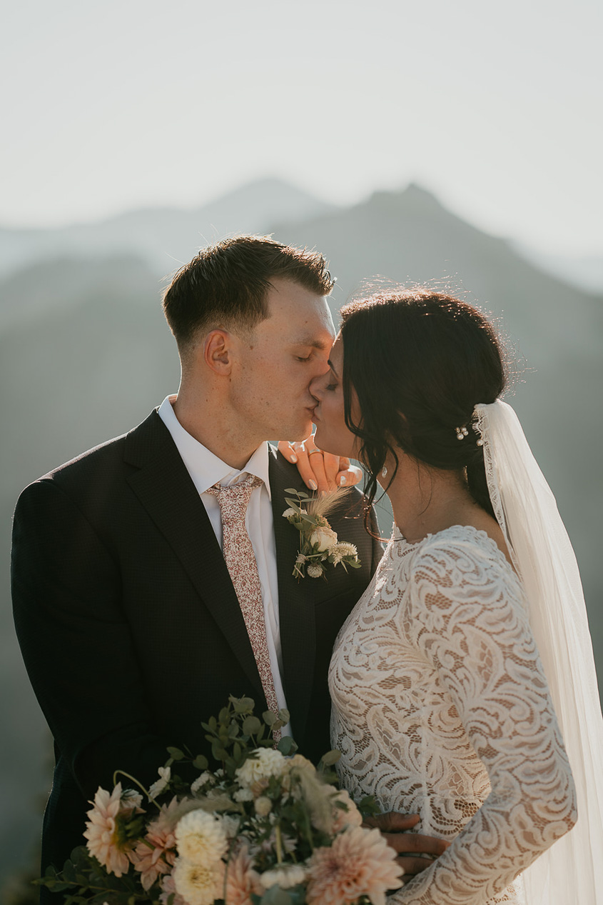 the newlyweds sharing their first kiss. 