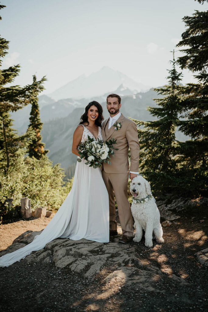 Bride and groom couple portraits with golden doodle in the North Cascades