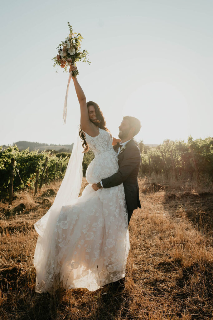Bride and groom sunset couple portraits at Oregon vineyard wedding