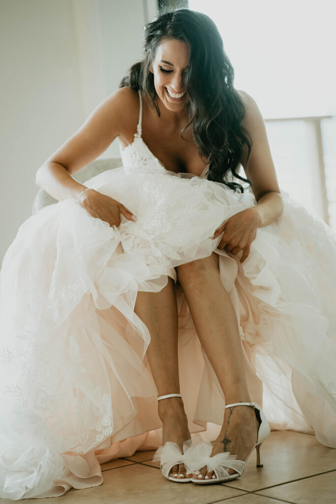 Bride wearing white tulle heels 