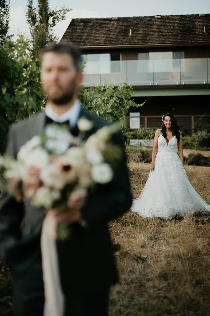 Bride and groom first look at Furioso Vineyards