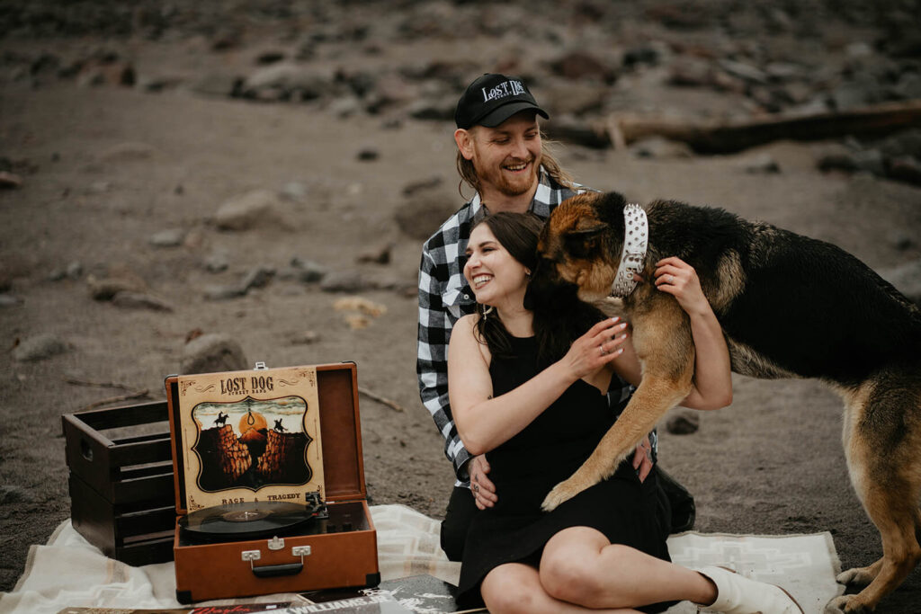 Dog jumps on couple during engagement session at Mt Hood