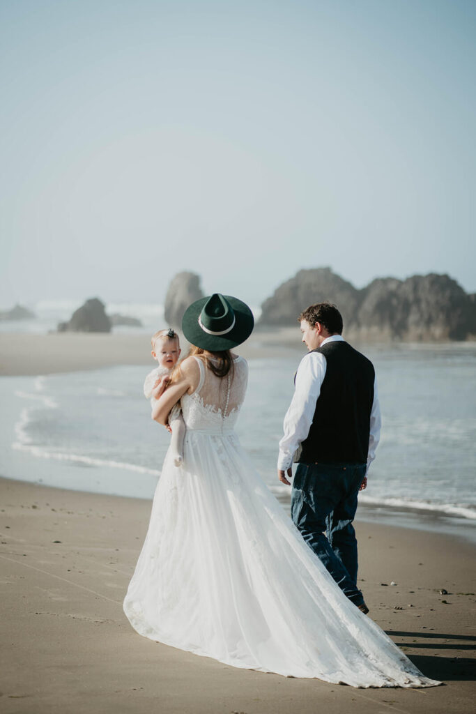 Family portraits during intimate beach wedding on the Oregon Coast