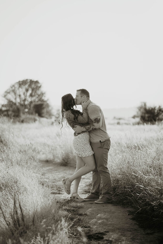 Couple kissing during their Discovery Park engagement photo session