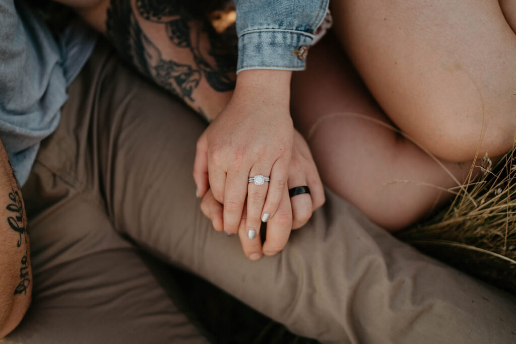 Black wedding ring and white diamond engagement ring