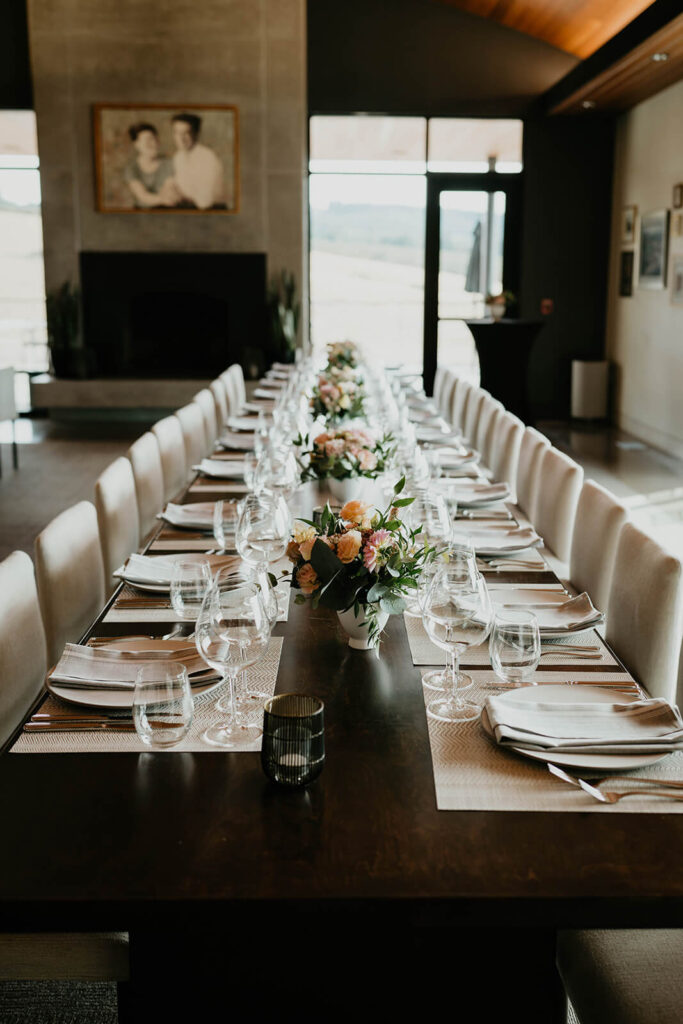 White vineyard wedding reception table decoration at Ponzi Vineyards