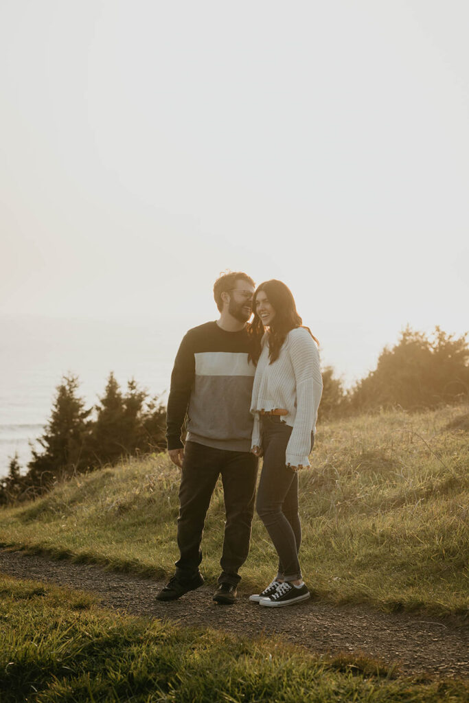 Couple portraits during beach engagement photo session at Cannon Beach