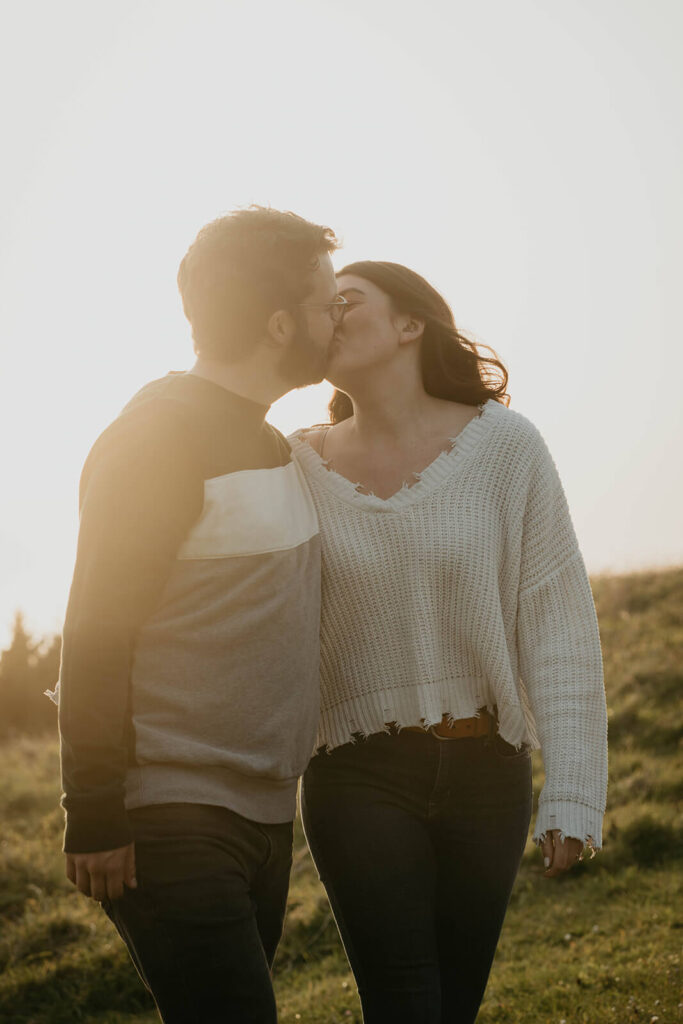 Couple kissing during Cannon Beach engagement photos