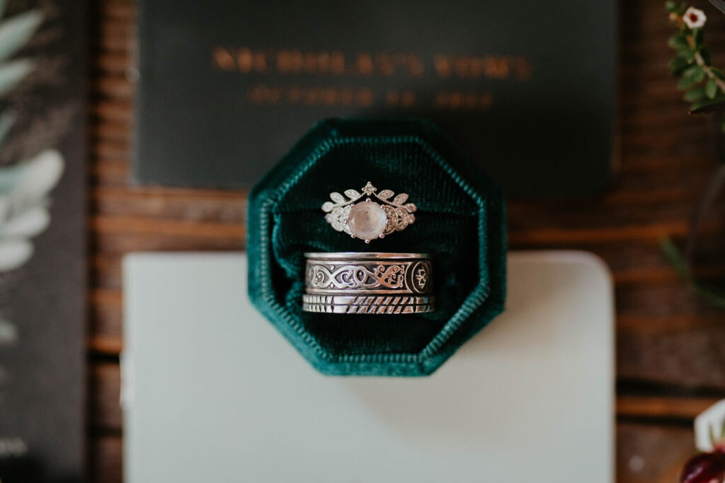 Wedding rings in green velvet box