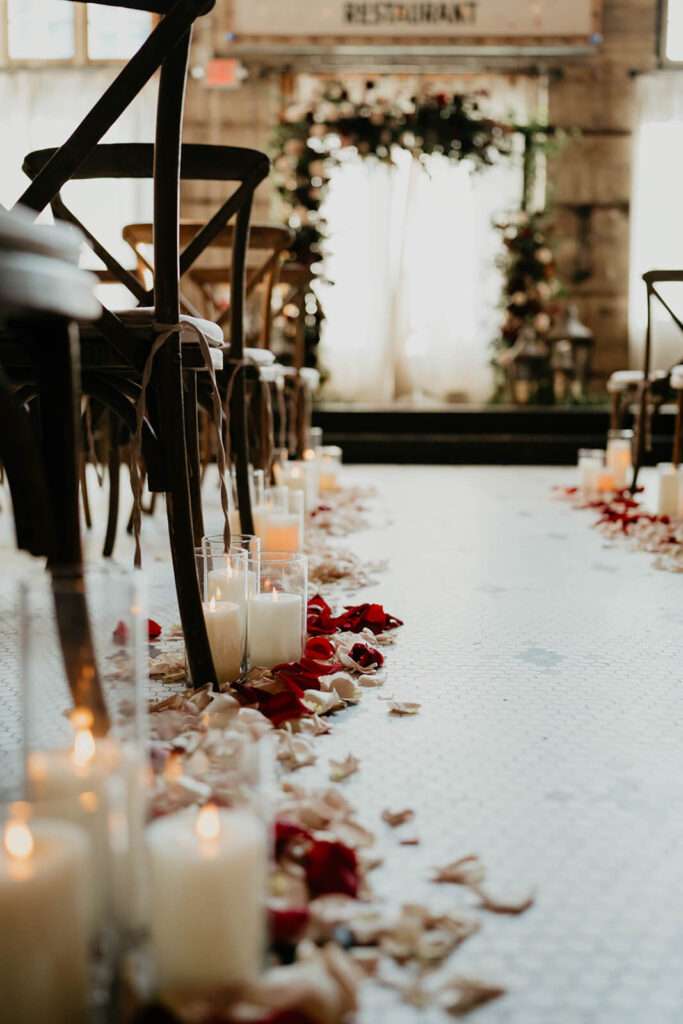 Candles lining wedding ceremony aisle