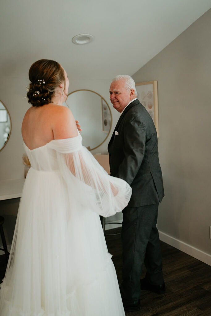 Bride and father first look