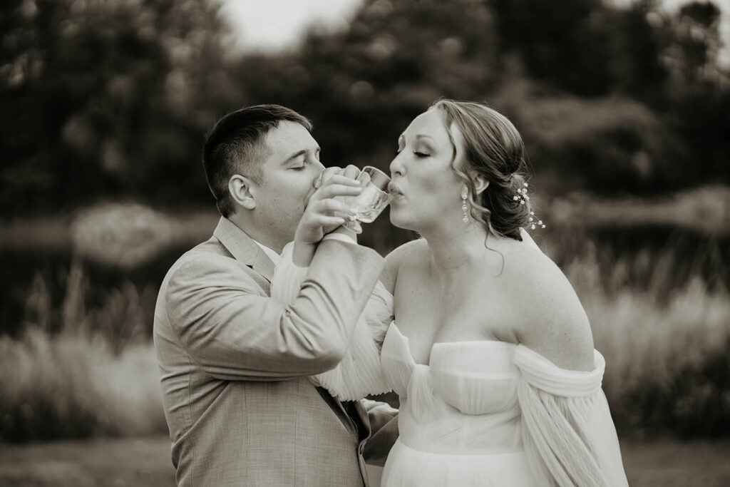 Bride and groom take shots after first look at Pemberton Farm