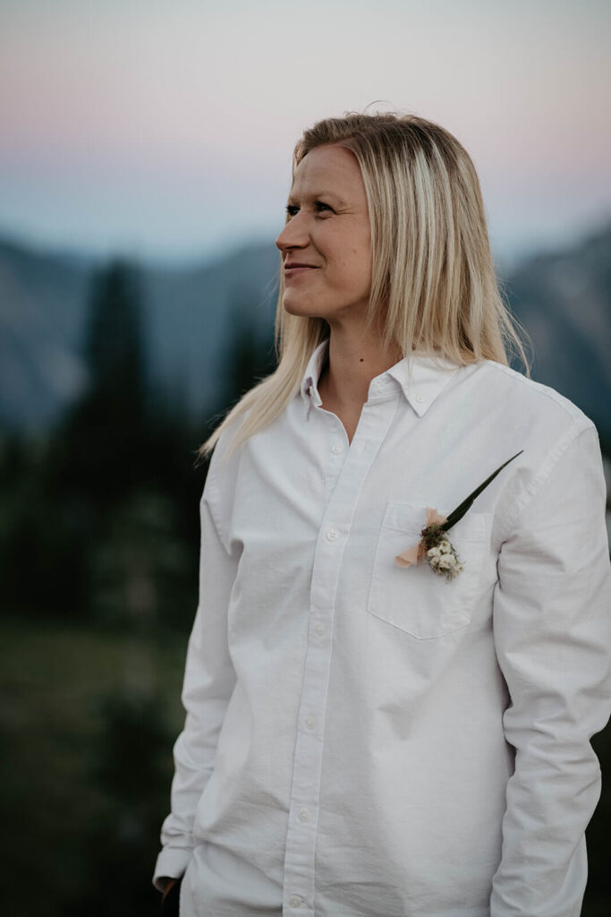Bride wearing white button down at Mt Rainier elopement
