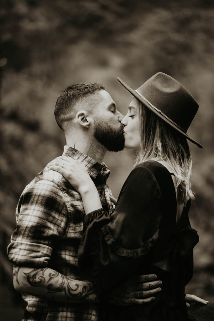 Couple kissing during engagement photoshoot in Oregon