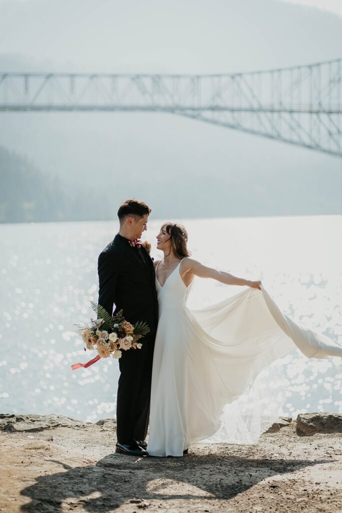 Bride and groom portrait photos at Cascades Locks in Oregon