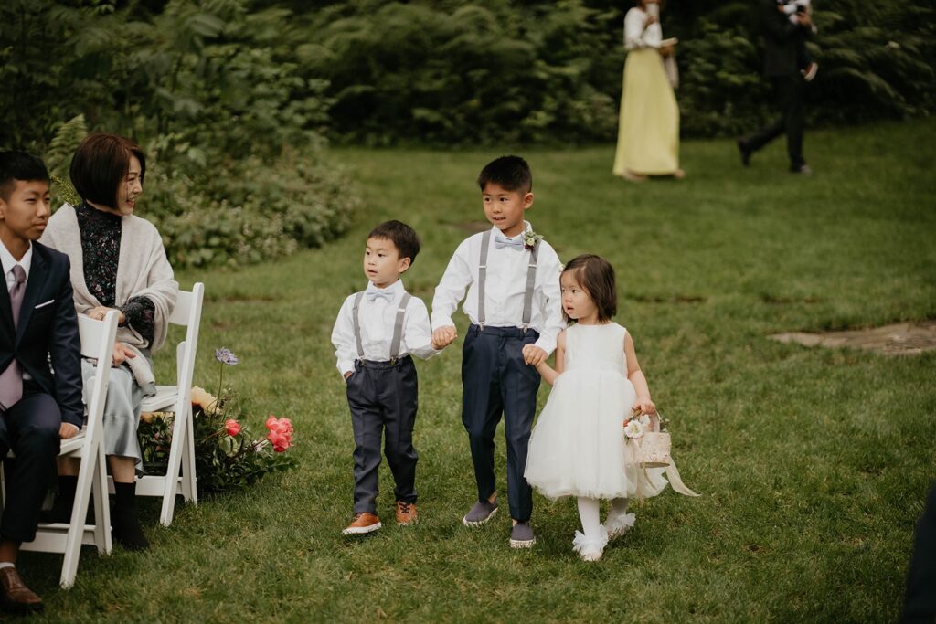 Flower girls and ring bearers enter Asian wedding at Bridal Veil Lakes