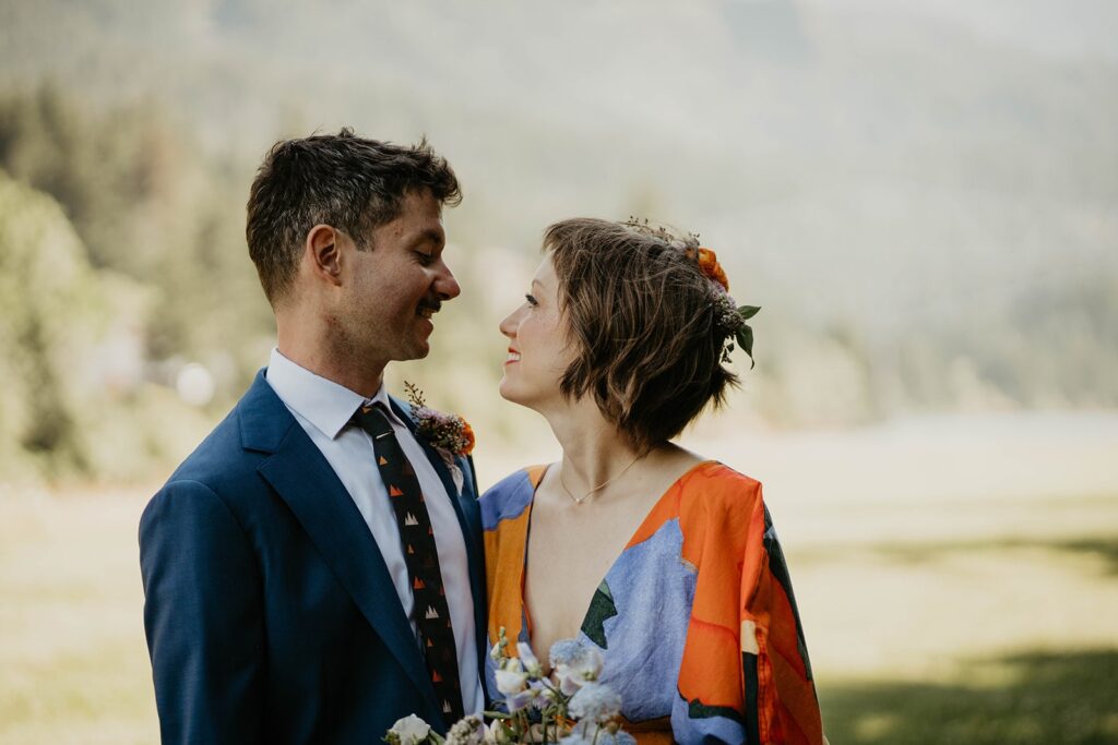 Bride and groom colorful wedding portraits at Cascade Locks