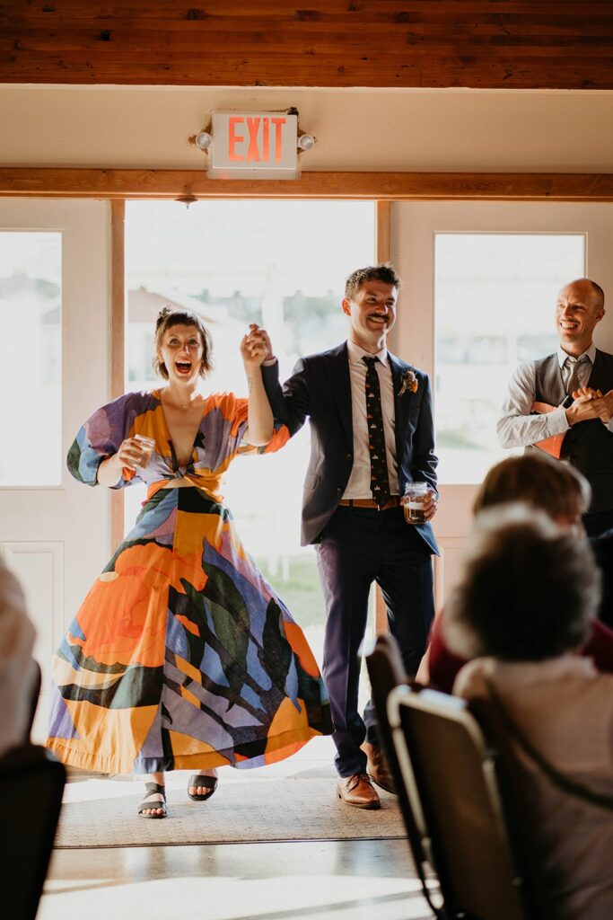 Bride and groom enter Cascade Locks wedding reception