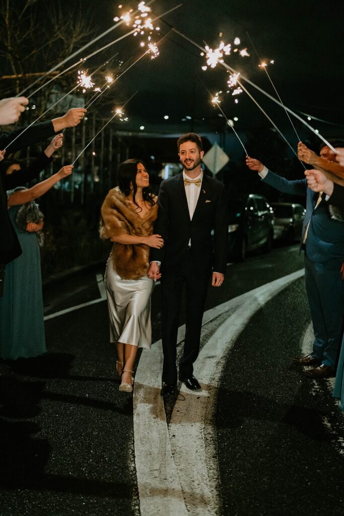 Bride and groom leave their Blockhouse Portland wedding with a sparkler exit