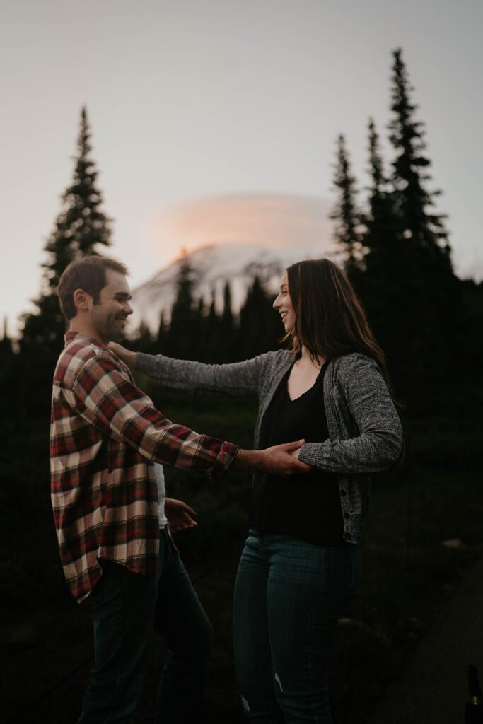 Couple dancing during Mt Rainier engagement photos