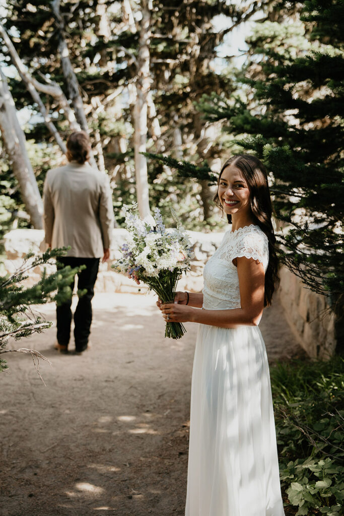 The bride smiling before her first look during her Mt Rainier elopement. 