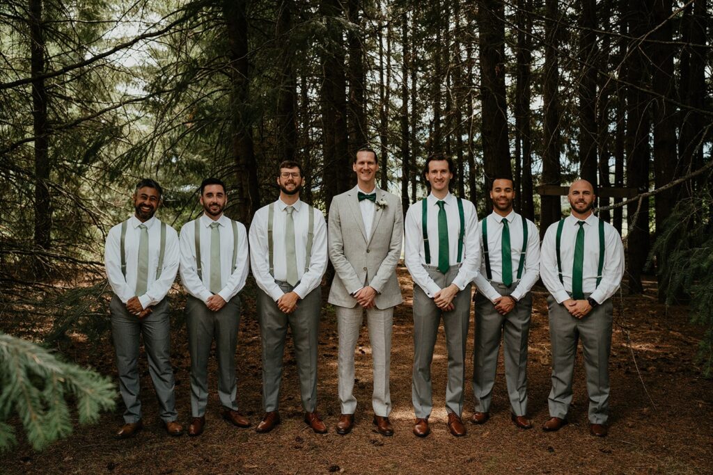 Groom and groomsman portraits in the forest at Gorge Crest Vineyards
