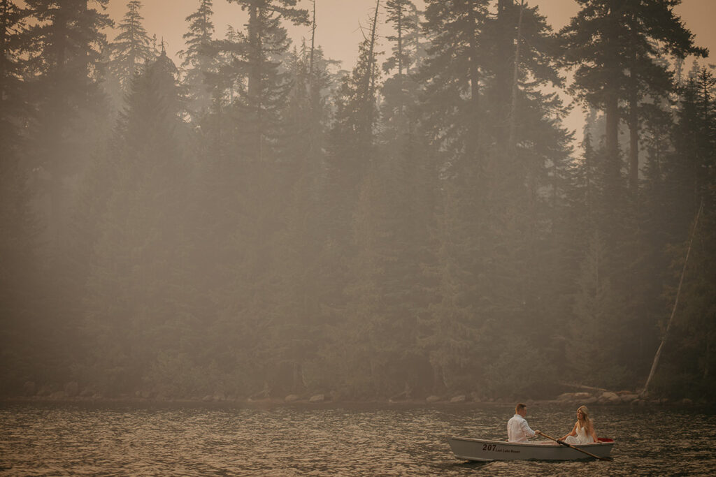 The couple on a row boat in Lost Lake during a smoky day. 