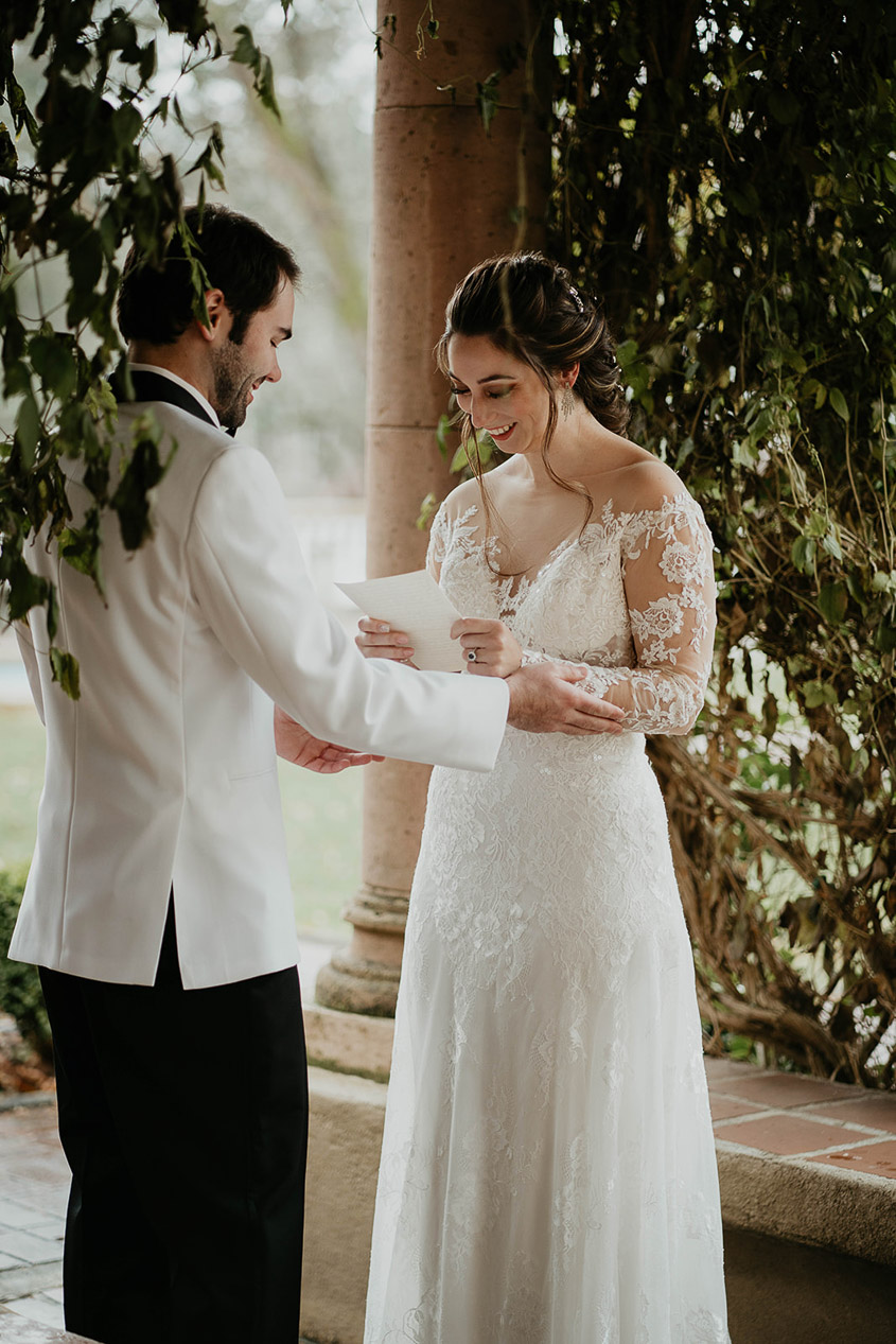 The bride delivering a personal letter to her groom at Lairmont Manor. 
