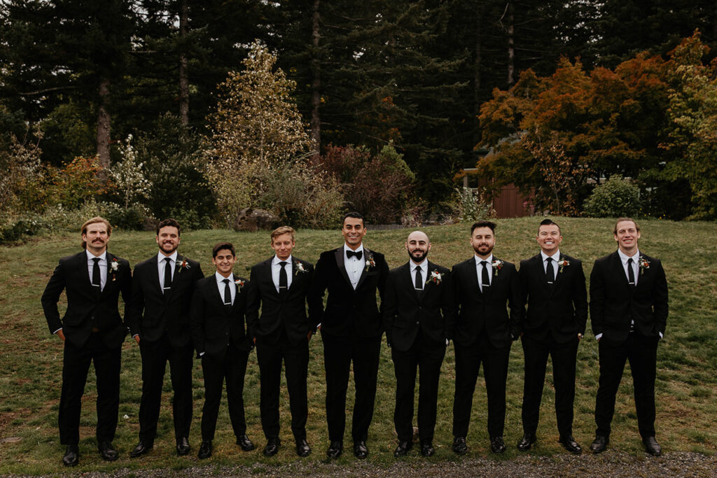 the groomsmen with the groom in the middle. 
